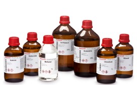 Seven bottles of solvents, blends, and reagents for chromatography.