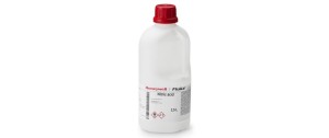 A plastic bottle filled with Honeywell TraceSelect Ultra Reagents